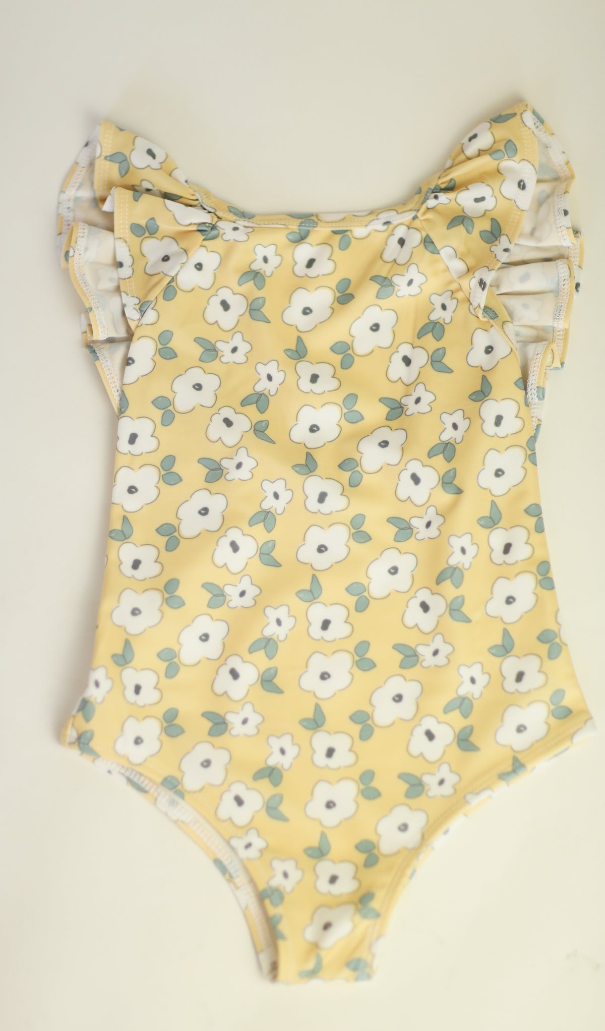 The Ruffle Back Bather - yellow flower