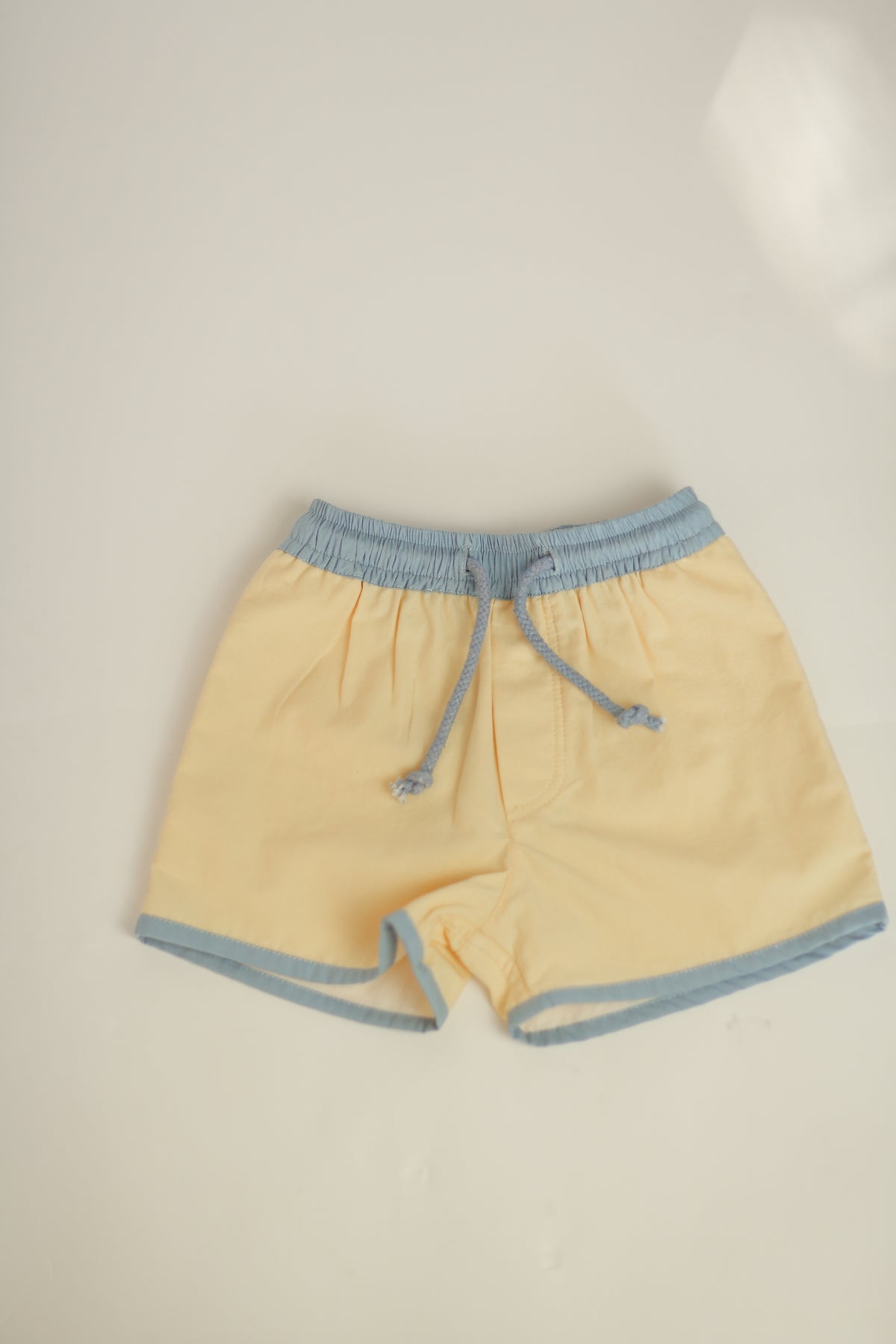 The Pop-On Short - cream w/ blue trim (SS26)