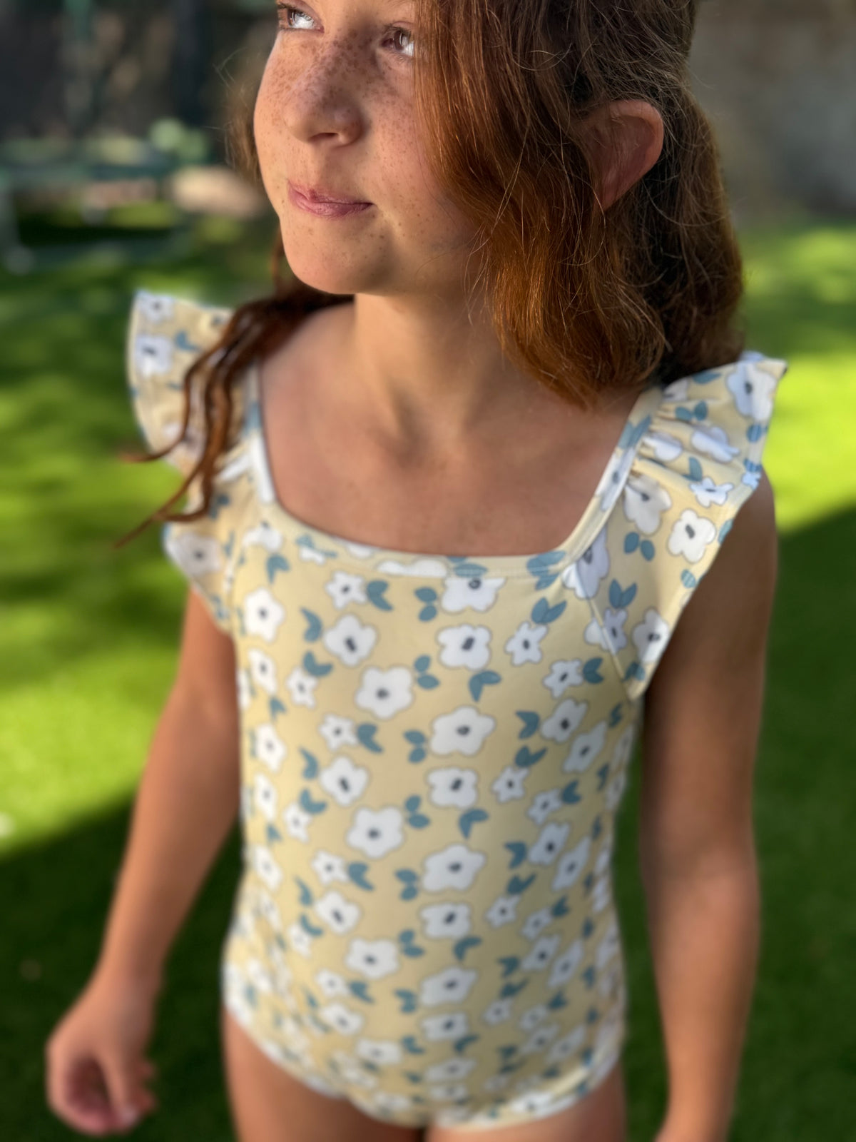 The Ruffle Back Bather - yellow flower